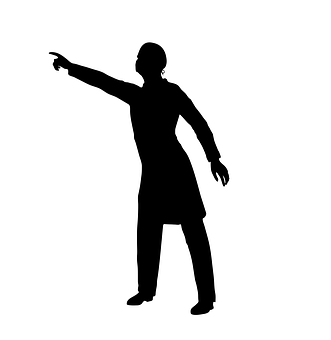 A Silhouette Of A Man Pointing