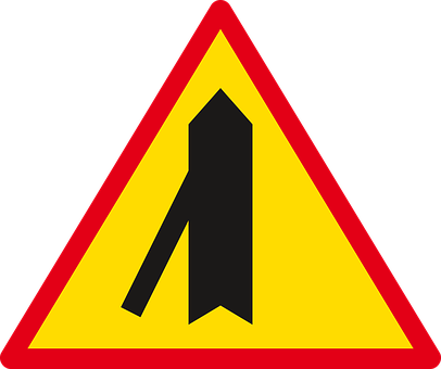 A Yellow Triangle With A Black Arrow