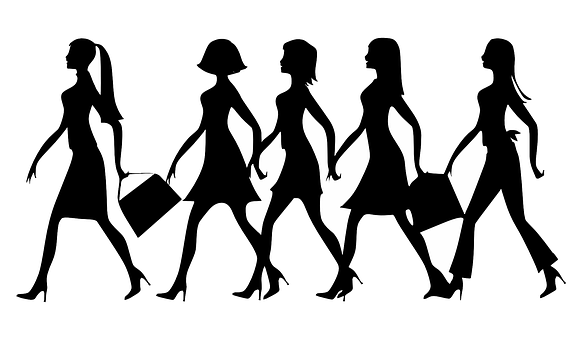 A Silhouette Of Women Walking