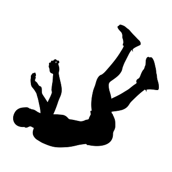 A Silhouette Of A Man Lying On The Ground
