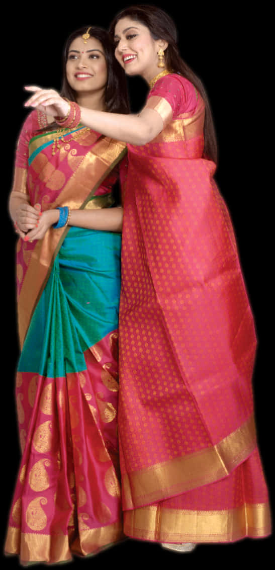Two Women Wearing Colorful Saris
