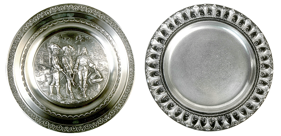 A Close-up Of A Silver Plate