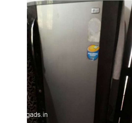 A Refrigerator With A Sticker On It