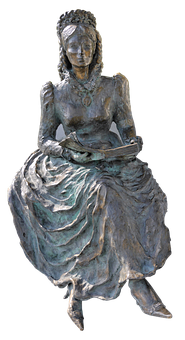 A Statue Of A Woman Sitting