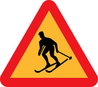A Sign With A Silhouette Of A Man On A Skis