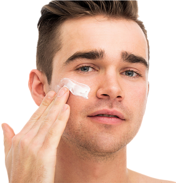 A Man Applying Cream On His Face