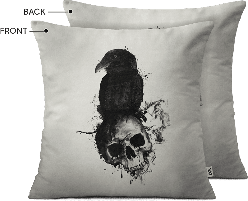 A Pillow With A Picture Of A Crow On Top Of A Skull