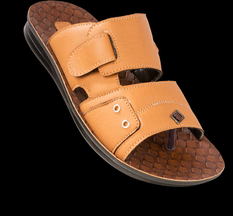 A Brown Sandal With A Black Background