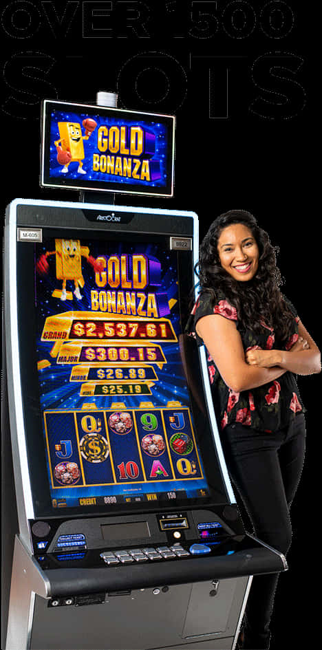 A Woman Standing Next To A Large Electronic Screen