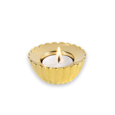 A Candle In A Gold Holder