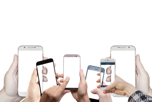 A Group Of Hands Holding Cell Phones