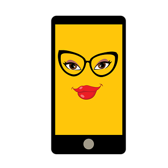 A Yellow Rectangular Device With A Cartoon Face On It