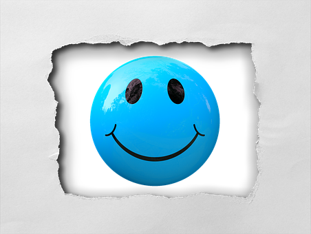 A Blue Smiley Face With Black Eyes