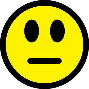 A Yellow Face With Black Eyes And A Black Background