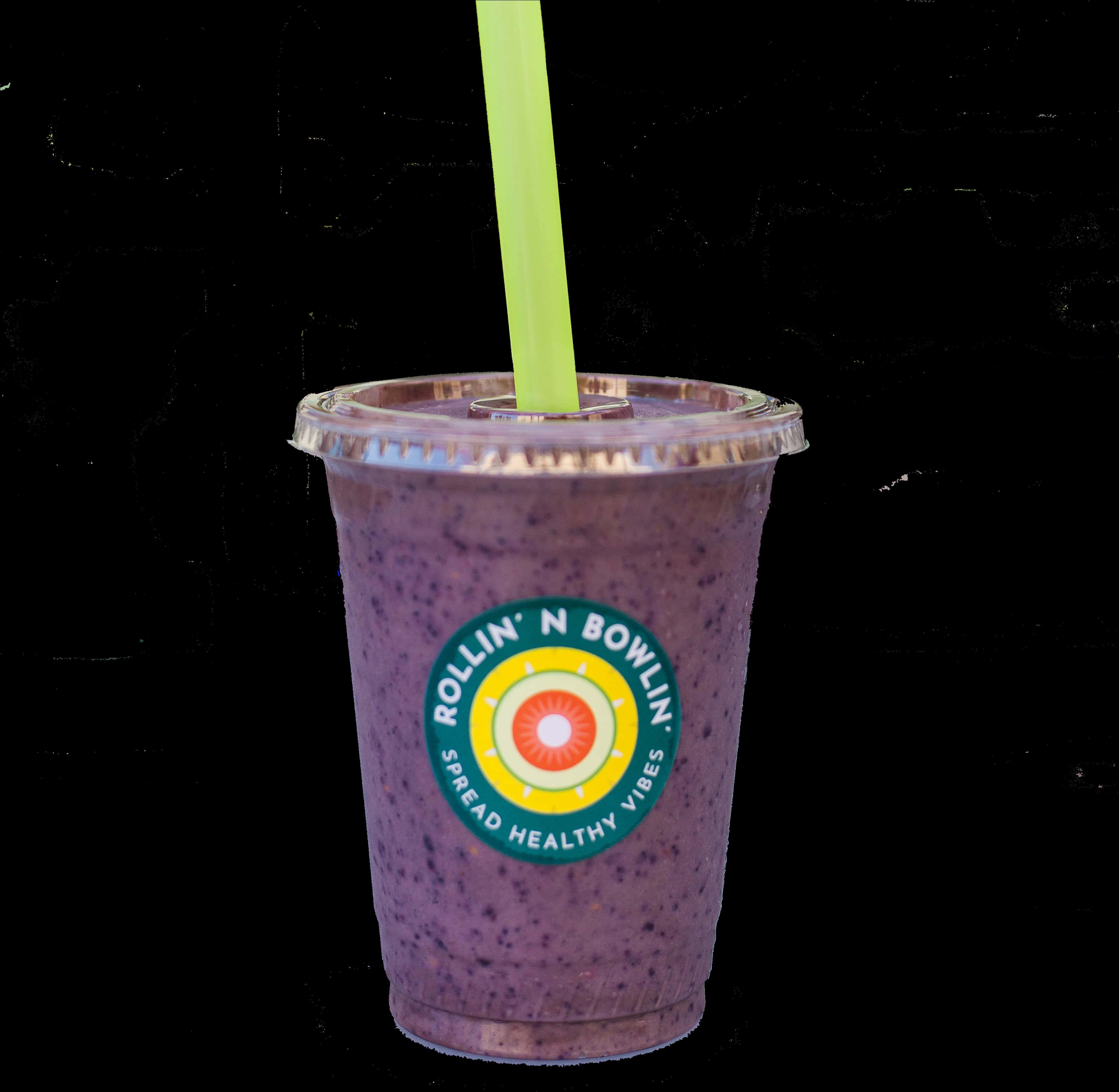 A Purple Smoothie With A Green Straw