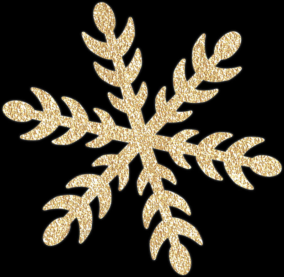 A Gold Snowflake On A Black Background