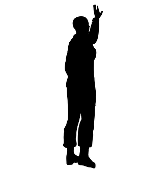 A Silhouette Of A Woman Raising Her Hand