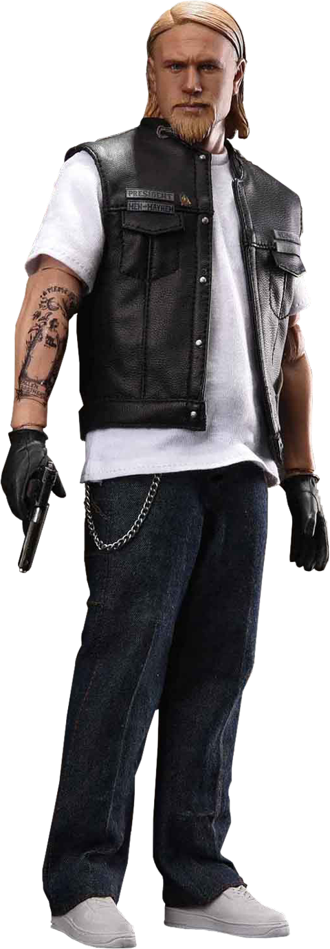 A Man With Tattoos And A Gun