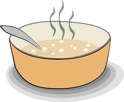 A Pot Of Soup With A Spoon