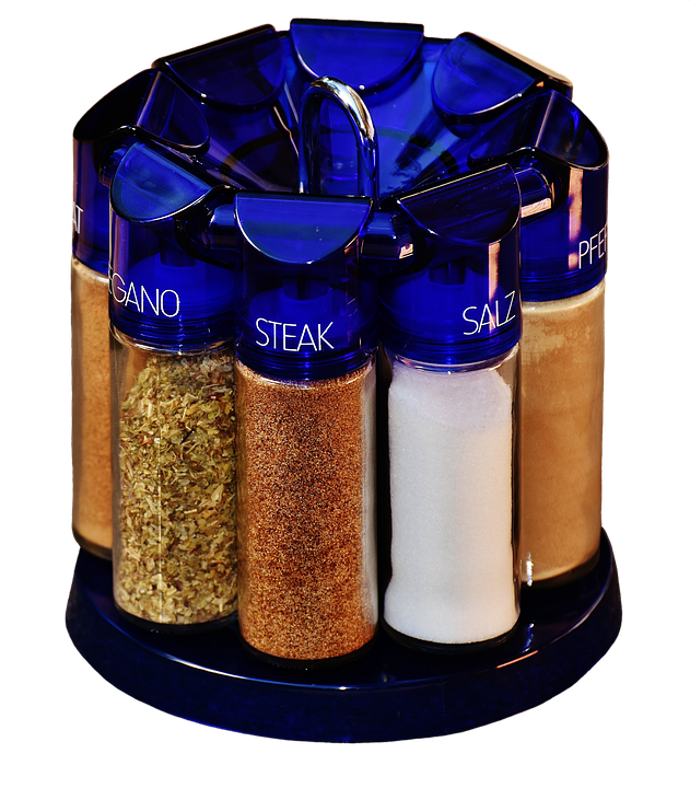 A Blue Spice Rack With Different Spices