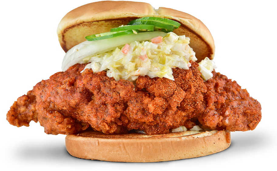 A Fried Chicken Sandwich With Coleslaw And Cucumber