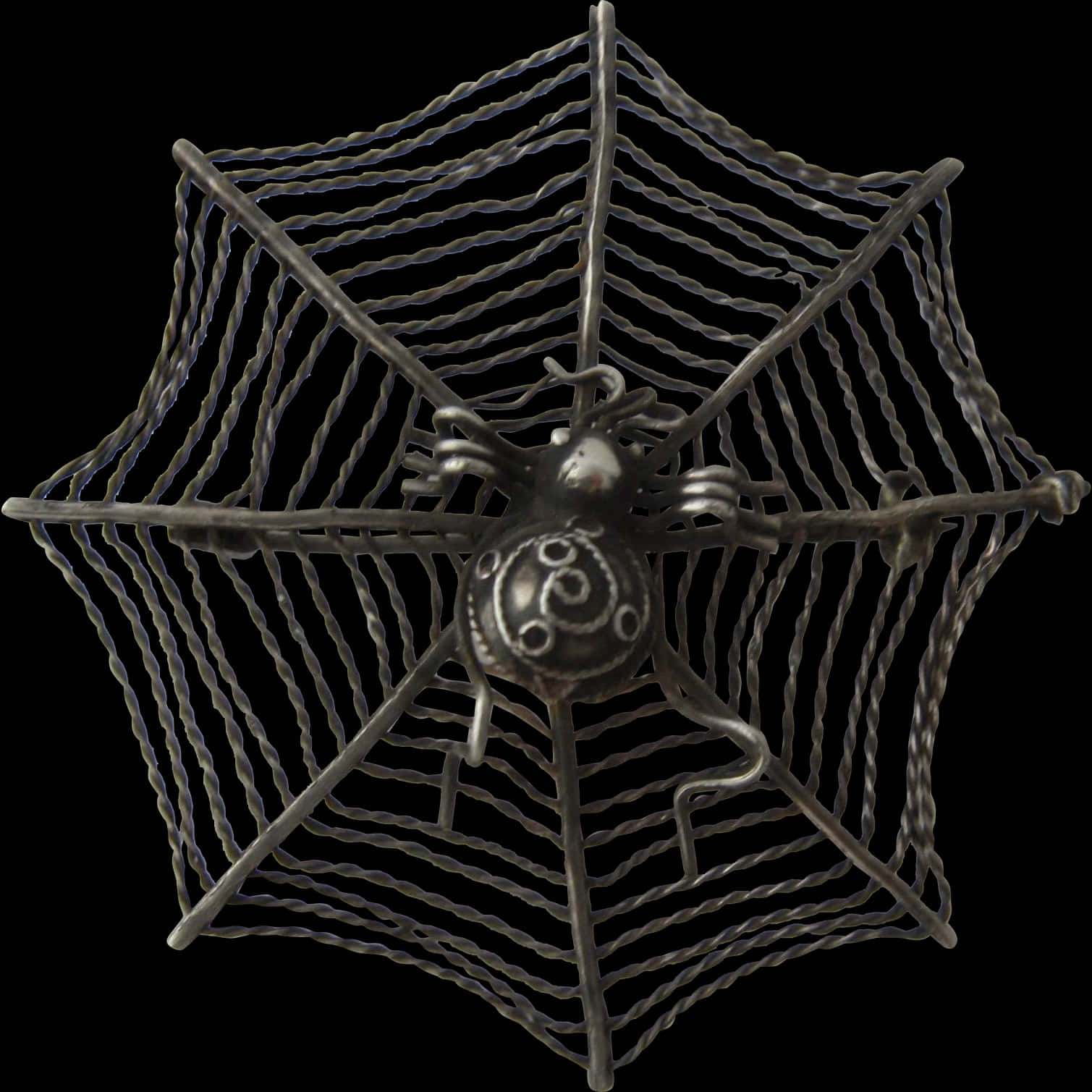 A Metal Spider Web With A Spider On It