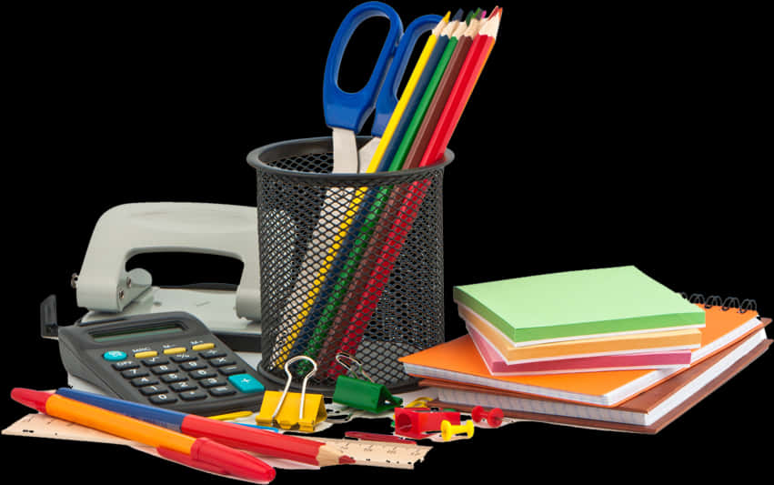 A Calculator And Stationery On A Desk