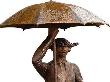 A Statue Of A Woman Holding An Umbrella