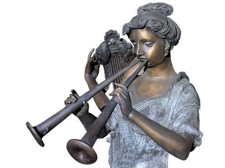 A Statue Of A Woman Playing A Trumpet