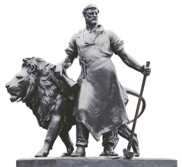 A Statue Of A Man Holding A Cane And A Lion