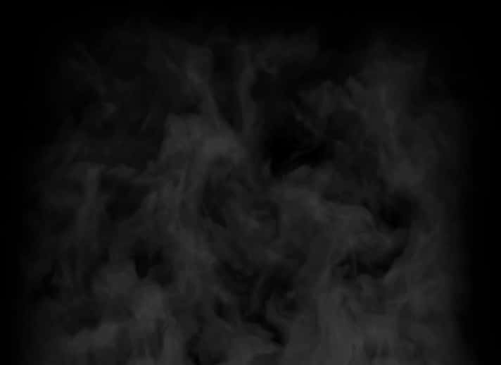 A Black Background With Smoke