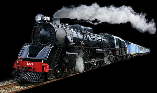 A Black Train With White Smoke Coming Out Of It