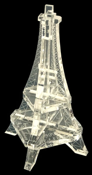 A Clear Glass Tower With A Black Background