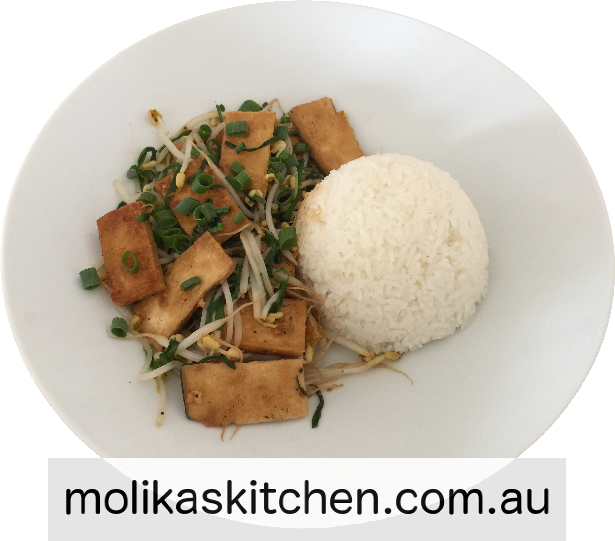 A Plate Of Food With Rice And Tofu