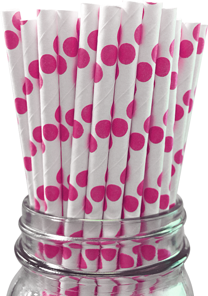 A Glass Jar Filled With Straws