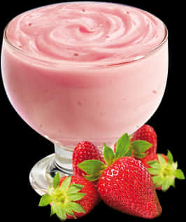 A Glass Of Pink Smoothie With Strawberries