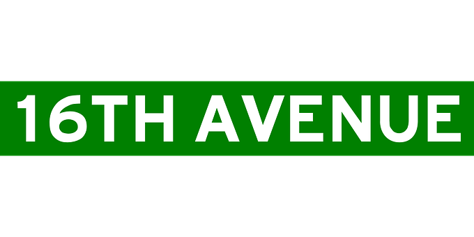 A Green And White Sign With White Text