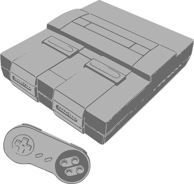 A Grey Rectangular Gaming Console And A Controller