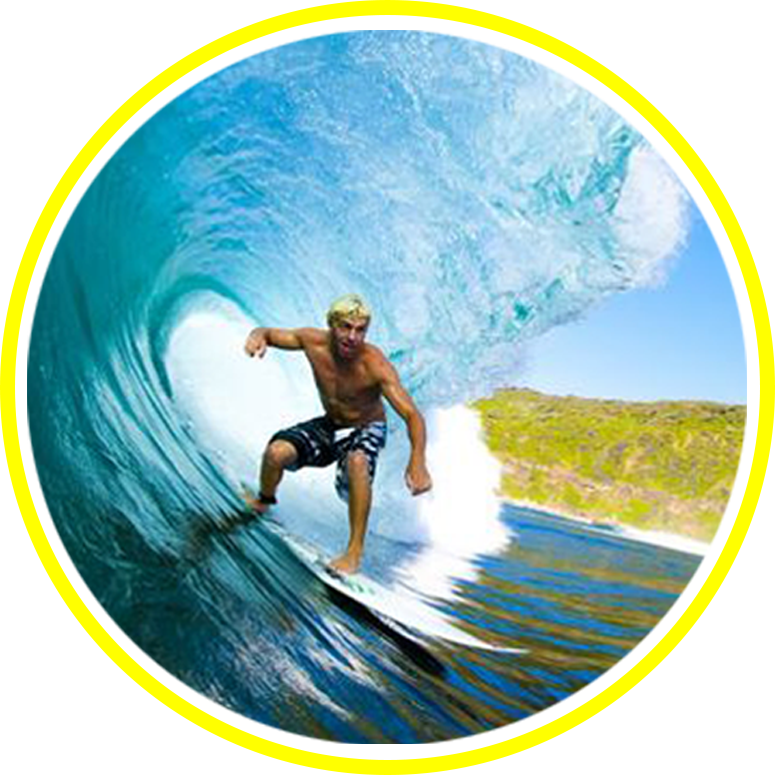 A Man Surfing In A Wave