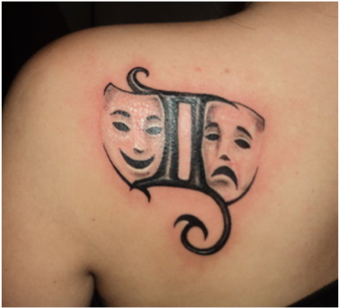 A Tattoo On The Shoulder Of A Person