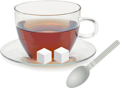 A Cup Of Tea With A Spoon And Cubes