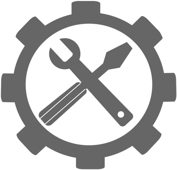 A Grey Gear With A Screwdriver And A Wrench