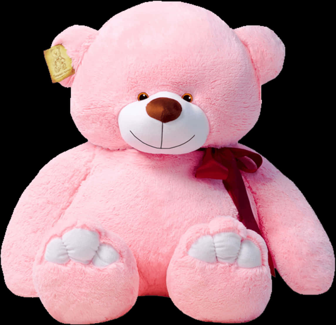 A Pink Teddy Bear With A Bow