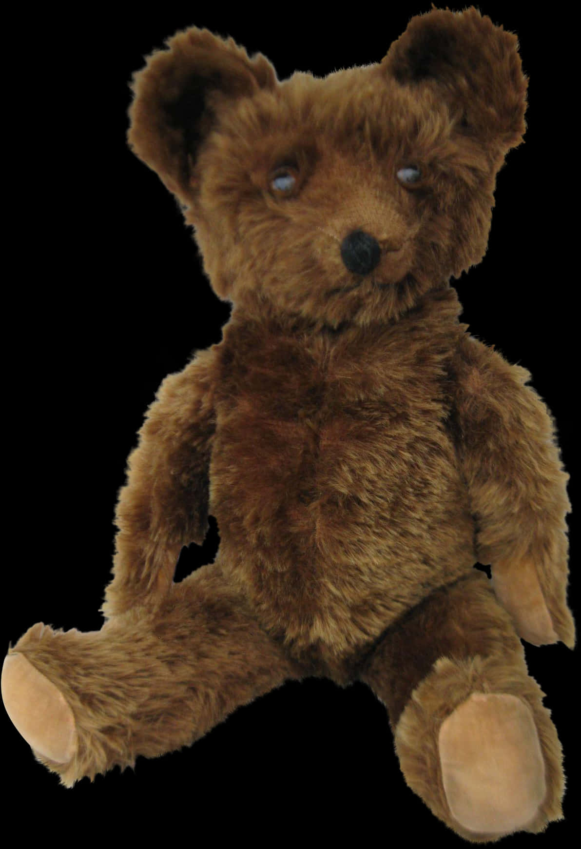 A Stuffed Bear With A Black Background