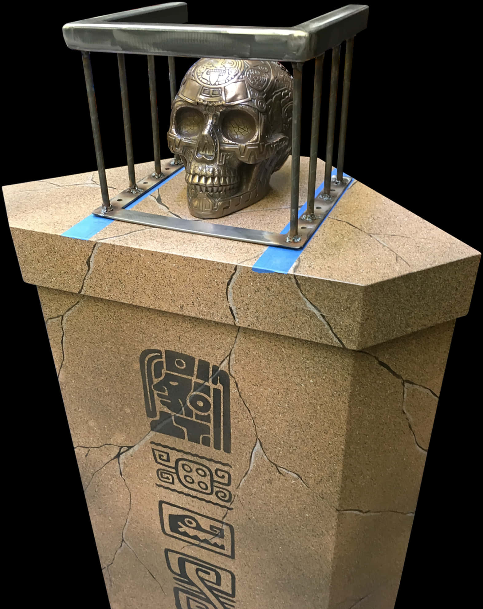 A Skull On Top Of A Stone Box