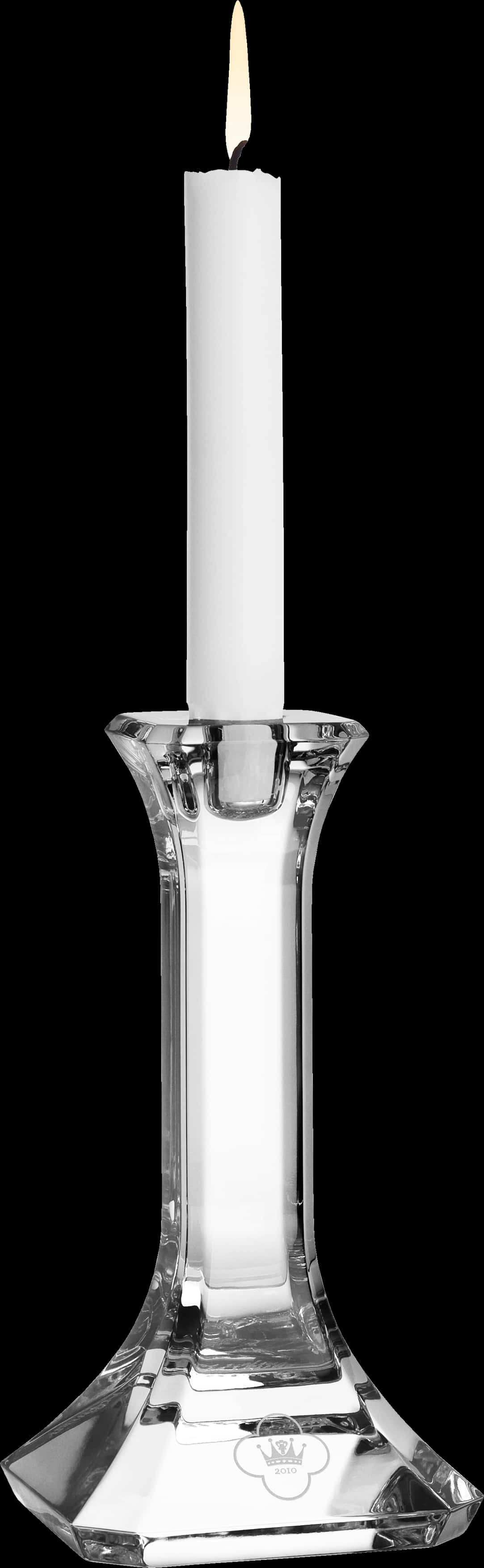 A Clear Candle Holder With A White Candle
