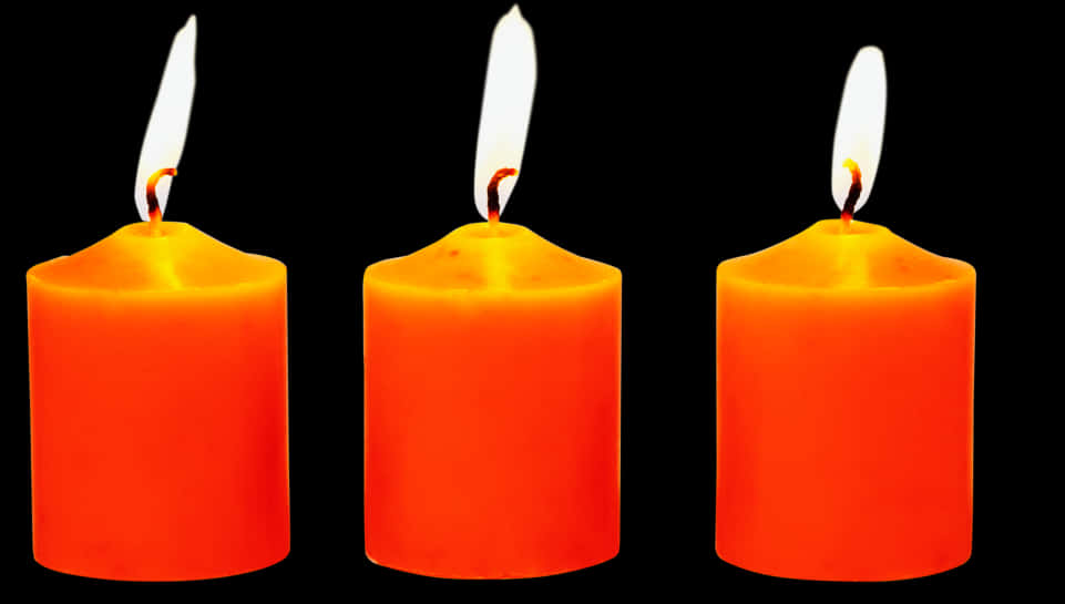 A Group Of Candles With Flame