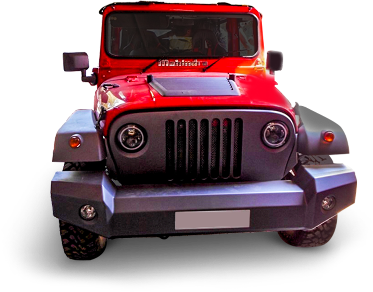 A Red Jeep With A Black Background