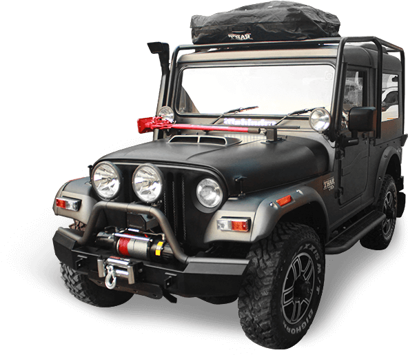A Black Jeep With A Red Bow On The Front