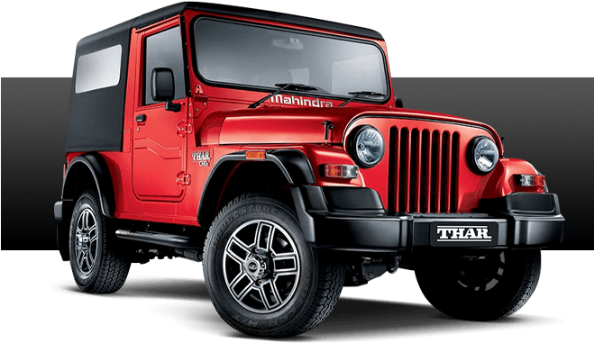 A Red Jeep With Black Roof